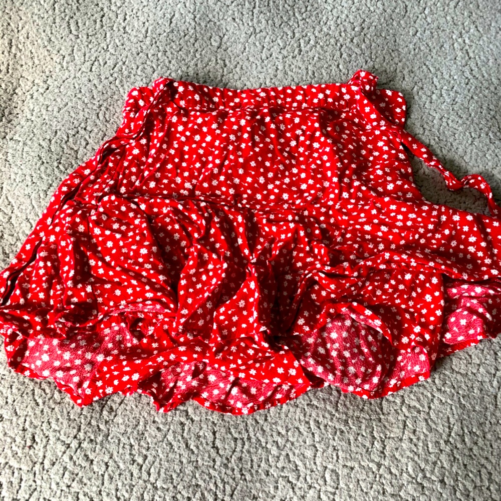 A red floral skirt